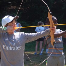 camper practicing archery