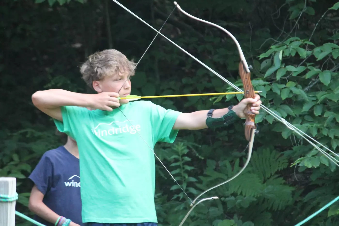 A camper at the archery range