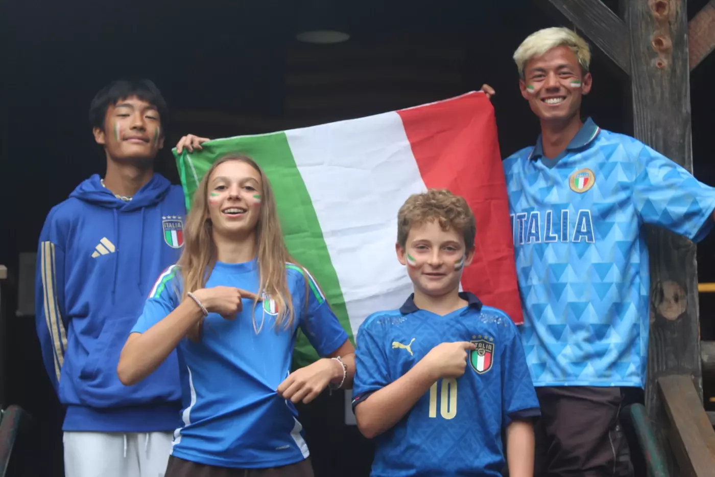 Campers and staff representing Italy at Twin Night at Windridge summer camp in Vermont