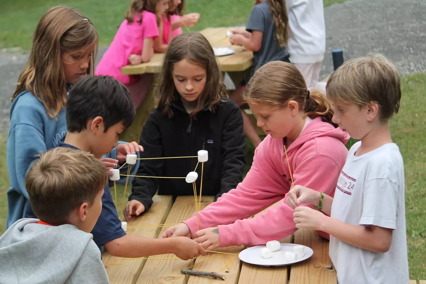 Younger campers taking on a Junior Program challenge.
