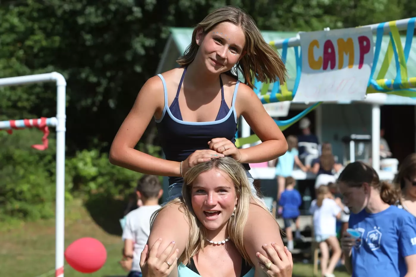 returning campers smiling together at Windridge summer camp in Vermont