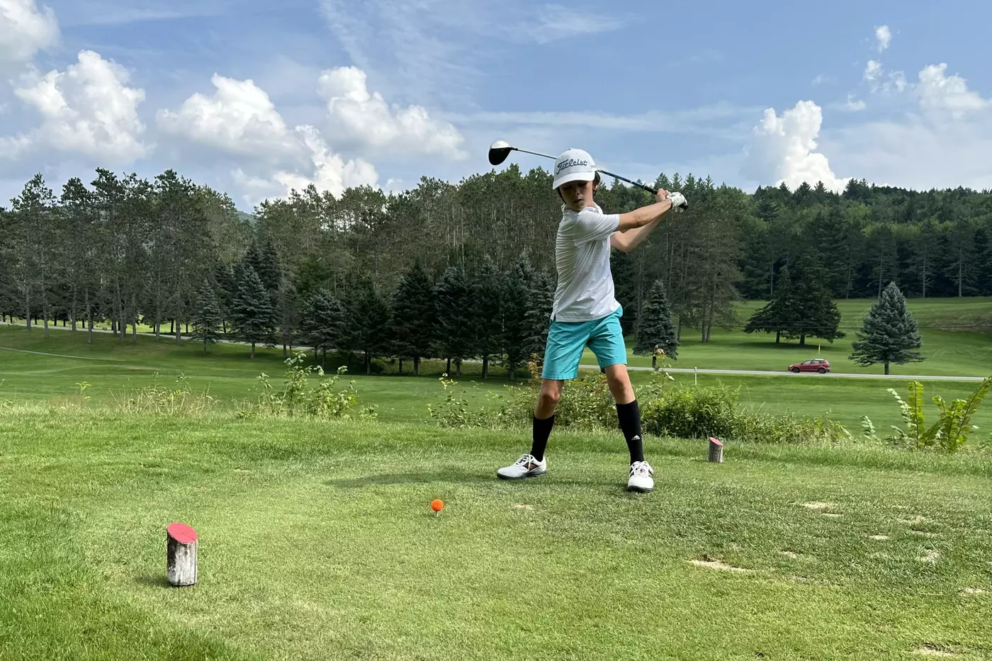 A Windridge camper tees off at the Northfield Country Club