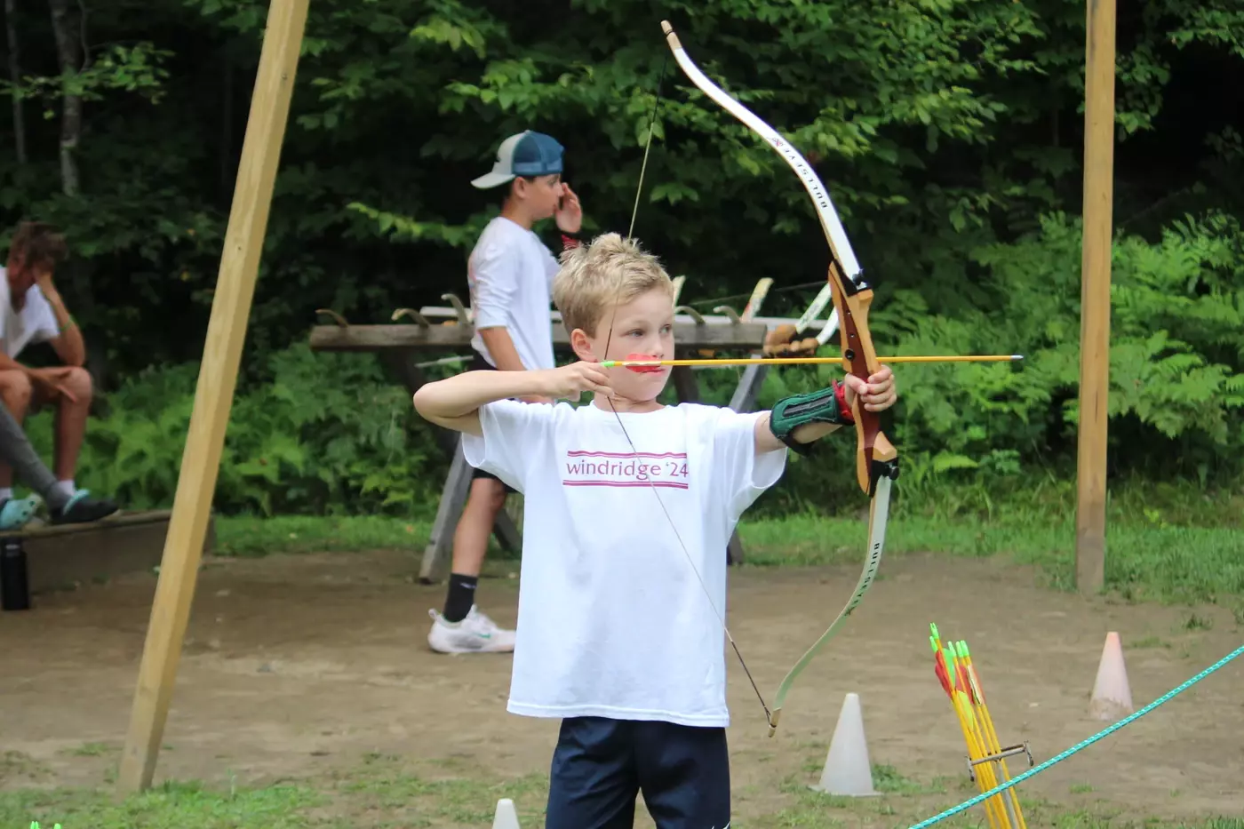 A Rookie Windridge camper in archery