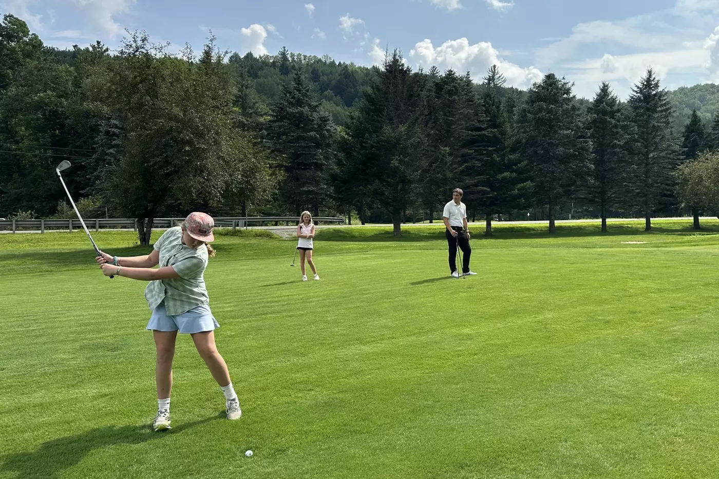 A Windridge camper golfing at the Northfield Country Club