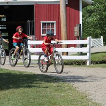 campers riding bikes