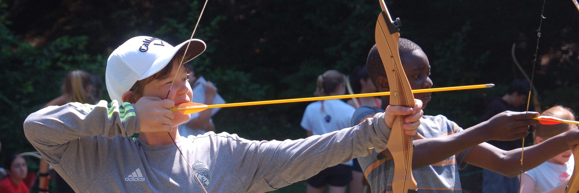 camper practicing archery 